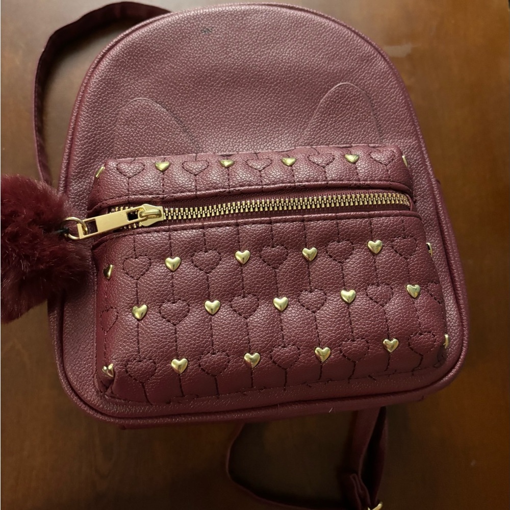 Under One Sky Maroon Backpack with Gold Heart Details